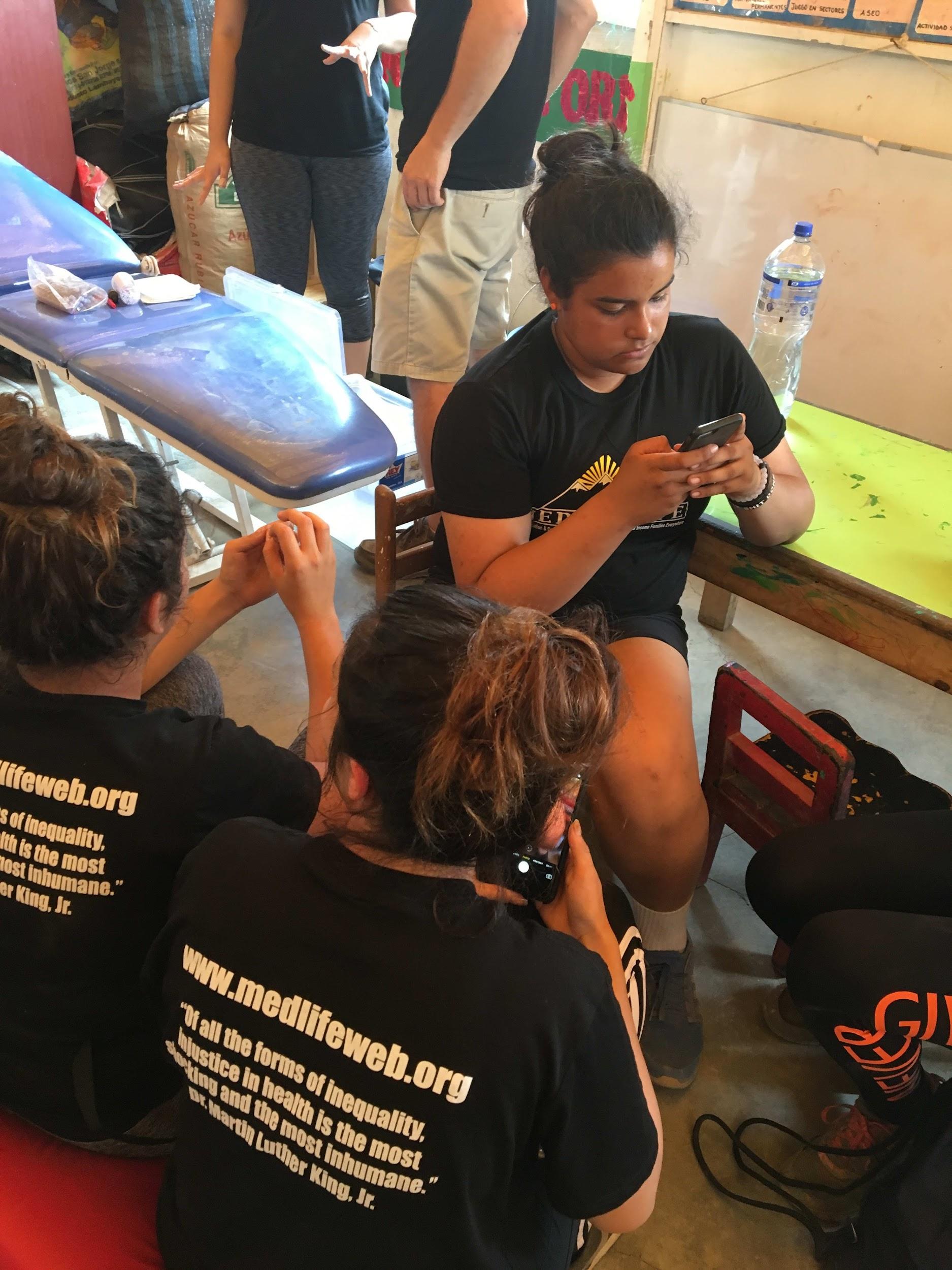 Berkeley students working alongside local staff at a mobile clinic station in Lima