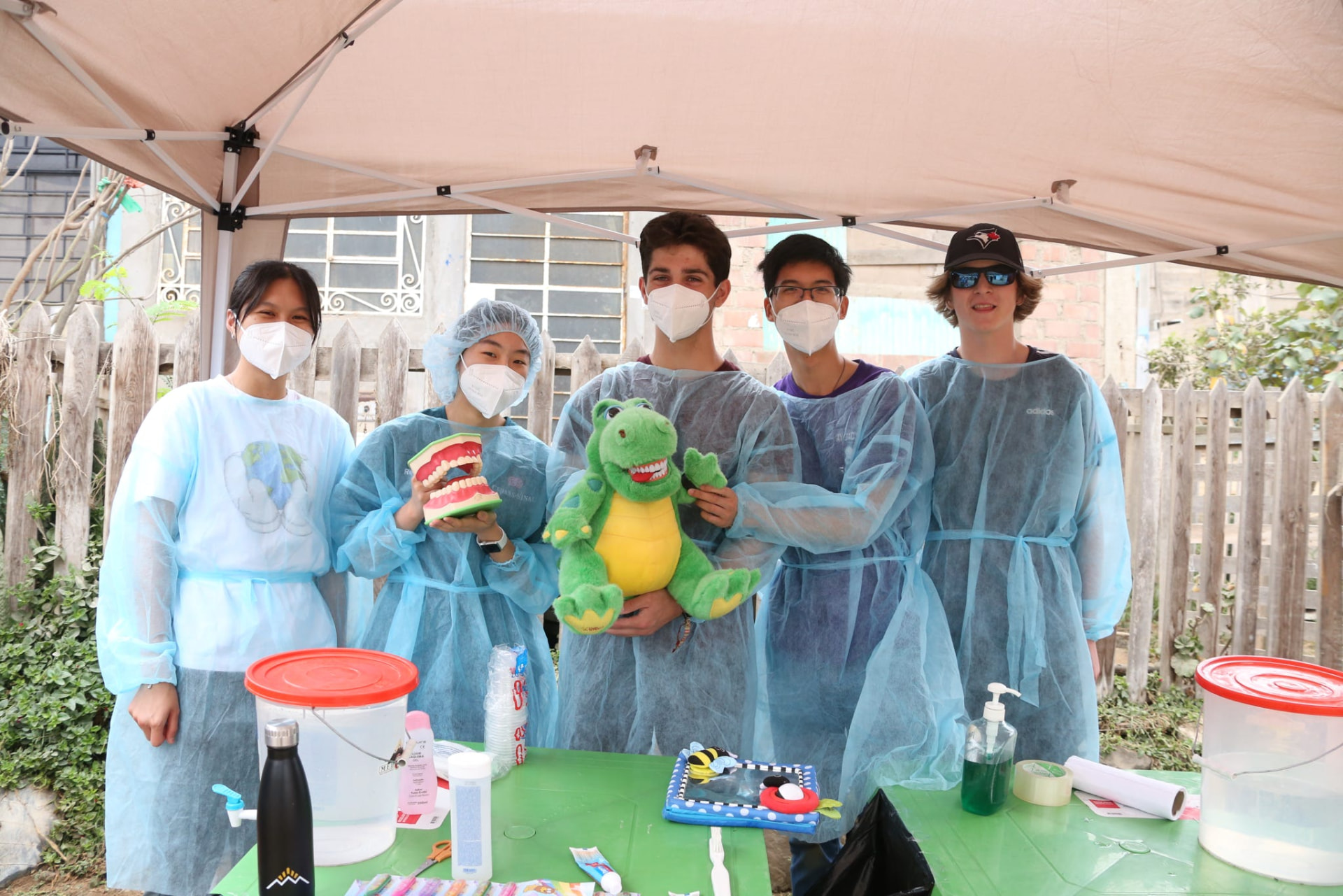 Students at a dental education station during a MEDLIFE mobile clinic in Lima